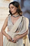 Seeaash_Ivory Lycra Embroidery Crystal Deep V Pre-draped Saree With Blouse _Online_at_Aza_Fashions