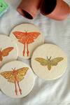 Shop_ARANYA EARTHCRAFT_Multi Color Papier Mache Hawk And Luna Carved Coasters Set_at_Aza_Fashions