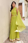 Palak & Mehak_Green Pure Crepe Print Bandhani Asymmetric Disha Lehenga With Blouse _at_Aza_Fashions