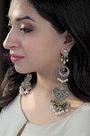 Buy_Heer-House Of Jewellery_Silver Plated Pearls Savera Long Carved Earrings_at_Aza_Fashions