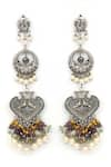 Shop_Heer-House Of Jewellery_Silver Plated Pearls Savera Long Carved Earrings_at_Aza_Fashions