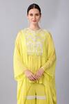 Keith Gomes_Yellow Georgette, Chiffon Sequins, Flower Yoke Embellished Tunic And Gharara Set _at_Aza_Fashions