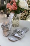 Buy_Sana K luxurious Footwear_Silver Swarovski Bow Embellished Sliders _at_Aza_Fashions