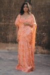 Buy_BAARO MASI_Peach Muslin Printed Floral Sweetheart Neck Pre-draped Saree With Blouse _at_Aza_Fashions