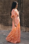 Shop_BAARO MASI_Peach Muslin Printed Floral Sweetheart Neck Pre-draped Saree With Blouse _Online_at_Aza_Fashions