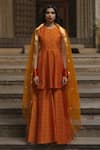 Buy_BAARO MASI_Orange Brocade Woven Vintage Pattern Round Peplum Kurta Sharara Set For Women_at_Aza_Fashions