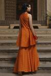 Shop_BAARO MASI_Orange Brocade Woven Vintage Pattern Round Peplum Kurta Sharara Set For Women_at_Aza_Fashions