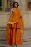 Shop_BAARO MASI_Orange Brocade Woven Vintage Pattern Round Peplum Kurta Sharara Set For Women_Online_at_Aza_Fashions