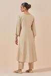 Shop_Ikshita Choudhary_Beige Chanderi Silk, Tissue Embroidery V-neck A-line Kurta Pant Set_at_Aza_Fashions