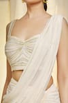 Vivek Patel_Ivory Georgette Hand Embroidered Beads Sweetheart Pre-draped Saree With Blouse _Online_at_Aza_Fashions