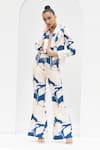 Mandira Wirk_Blue Printed Texture Lapel Mystic Jacket And Pant Set _at_Aza_Fashions