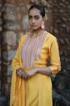 Label Kinjal Modi_Yellow Chanderi Embroidered Sequins Round Mirror Kurta Pant Set _at_Aza_Fashions