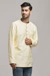 Buy_Arihant Rai Sinha_Cream Poly Cotton Textured Pattern Short Kurta _at_Aza_Fashions