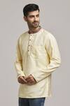 Buy_Arihant Rai Sinha_Cream Poly Cotton Textured Pattern Short Kurta _Online_at_Aza_Fashions