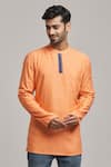 Buy_Arihant Rai Sinha_Peach Poly Cotton Textured Short Kurta _at_Aza_Fashions