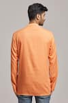 Shop_Arihant Rai Sinha_Peach Poly Cotton Textured Short Kurta _at_Aza_Fashions