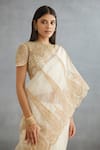 Torani_Ivory Raw Silk Hand Embroidery Dori Round Neck Gul Bano Yashoda Blouse _at_Aza_Fashions