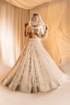 Buy_Aakansha Gupta_Ivory Organza Embroidery Sequin Leaf Neck Pearl Bridal Lehenga Set _at_Aza_Fashions