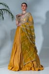 Buy_Neha Khullar_Yellow Tissue Silk Embroidered Mirror V Neck Embellished Lehenga Set _at_Aza_Fashions