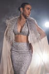 Manika Nanda_Silver German Satin Gigi Feather Embellished Cape Skirt Set  _at_Aza_Fashions