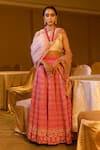 Buy_Ojasmé by Sanjana Thapa_Pink Blouse And Lehenga Raw Silk Embroidery Thread Round Bridal Set  _at_Aza_Fashions