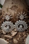 Shop_Neeta Boochra_Silver Plated Carved And Kundan Embellished Floral Cut Work Statement Earrings _at_Aza_Fashions