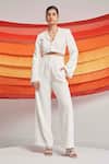 Buy_Detales_Ivory Biscuit Crepe Plain Notched Lapel Nirvana Crop Top And Pleated Trouser Set_at_Aza_Fashions