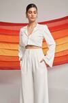 Shop_Detales_Ivory Biscuit Crepe Plain Notched Lapel Nirvana Crop Top And Pleated Trouser Set_Online_at_Aza_Fashions