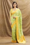 Buy_Resa by Ushnakmals_Green Mushroo Silk Woven Floral Pattern Saree With Running Blouse _at_Aza_Fashions