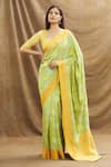 Shop_Resa by Ushnakmals_Green Mushroo Silk Woven Floral Pattern Saree With Running Blouse _at_Aza_Fashions