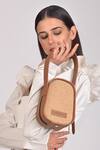 Shop_X Feet Above_Brown Woven Berlin Jute Egg Shaped Bag _at_Aza_Fashions