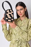 Buy_X Feet Above_Black Checkered Pattern Berlin Leather Egg Shaped Bag _at_Aza_Fashions