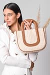 Buy_X Feet Above_Ivory Woven Kyoto Raffia Tote Bag _at_Aza_Fashions