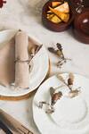 Buy_Elm & Oak_Brown Wood And Brass Carved Chestnut Oak Napkin Rings Set Of 4_at_Aza_Fashions