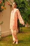 Shop Tasuvure Indes Peach Satin, Net, Silk Applique, Floral Thread Embroidered Tunic With Pant at Aza Fashions Shop_Tasuvure Indes_Peach Satin, Net, Silk Applique, Floral Thread Embroidered Tunic With Pant _at_Aza_Fashions