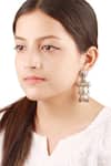 Buy_Sangeeta Boochra_Silver Plated Floral Carved Jhumkas _at_Aza_Fashions
