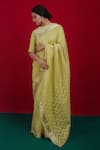 Buy_Naina Jain_Yellow Organza Woven Bandhani Round Neck Zari Border Saree With Blouse _at_Aza_Fashions