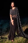 Buy_Naina Jain_Black Chiffon Handwoven And Striped Saree With Unstitched Blouse Piece _at_Aza_Fashions