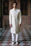 Shop_Ankit V Kapoor_Ivory Cotton Silk Embroidered And Woven Thread Work Turbat Paisley Sherwani Set_at_Aza_Fashions