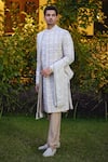 Buy_Ankit V Kapoor_Beige Cotton Silk Embroidered And Woven Thread Imran Mughal Sherwani Set_at_Aza_Fashions