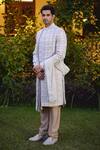 Ankit V Kapoor_Beige Cotton Silk Embroidered And Woven Thread Imran Mughal Sherwani Set_Online_at_Aza_Fashions