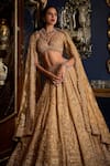 Shop_Seema Gujral_Gold Net Embroidery Thread Leaf Neck Flower Bridal Lehenga Set  _Online_at_Aza_Fashions