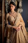 Shop_Seema Gujral_Gold Net Embroidery Thread Leaf Neck Flower Bridal Lehenga Set  _at_Aza_Fashions