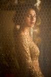 Seema Gujral_Gold Net Beads, Pearls, Sequins Plunge Mirror And Embroidered Bridal Lehenga Set_at_Aza_Fashions