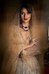 Shop_Seema Gujral_Gold Net Beads, Pearls, Sequins Plunge Mirror And Embroidered Bridal Lehenga Set