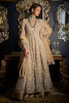 Buy_Seema Gujral_Beige Net Embroidered Cutdana Deep V Cut And Sequin Jacket Sharara Set  _Online_at_Aza_Fashions