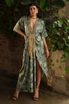 Buy_Kaprapan by Anaita Shah_Green Satin Printed Lotus Deep V Neck Draped Asymmetric Kaftan _at_Aza_Fashions