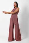 Buy_Swatee Singh_Pink Lurex Halter Neck Criss Cross Draped Jumpsuit _Online_at_Aza_Fashions
