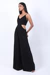 Swatee Singh_Black Crepe V-neck Side Cut-out Sleeveless Jumpsuit _Online_at_Aza_Fashions