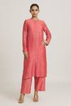 Buy_Urvashi Kaur_Coral Chanderi Silk Embroidered Stripe Round Button Down Tunic _at_Aza_Fashions